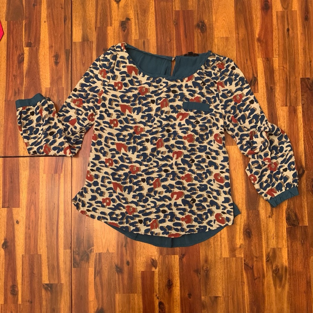 Cheetah print blouse! Very flattering fit!